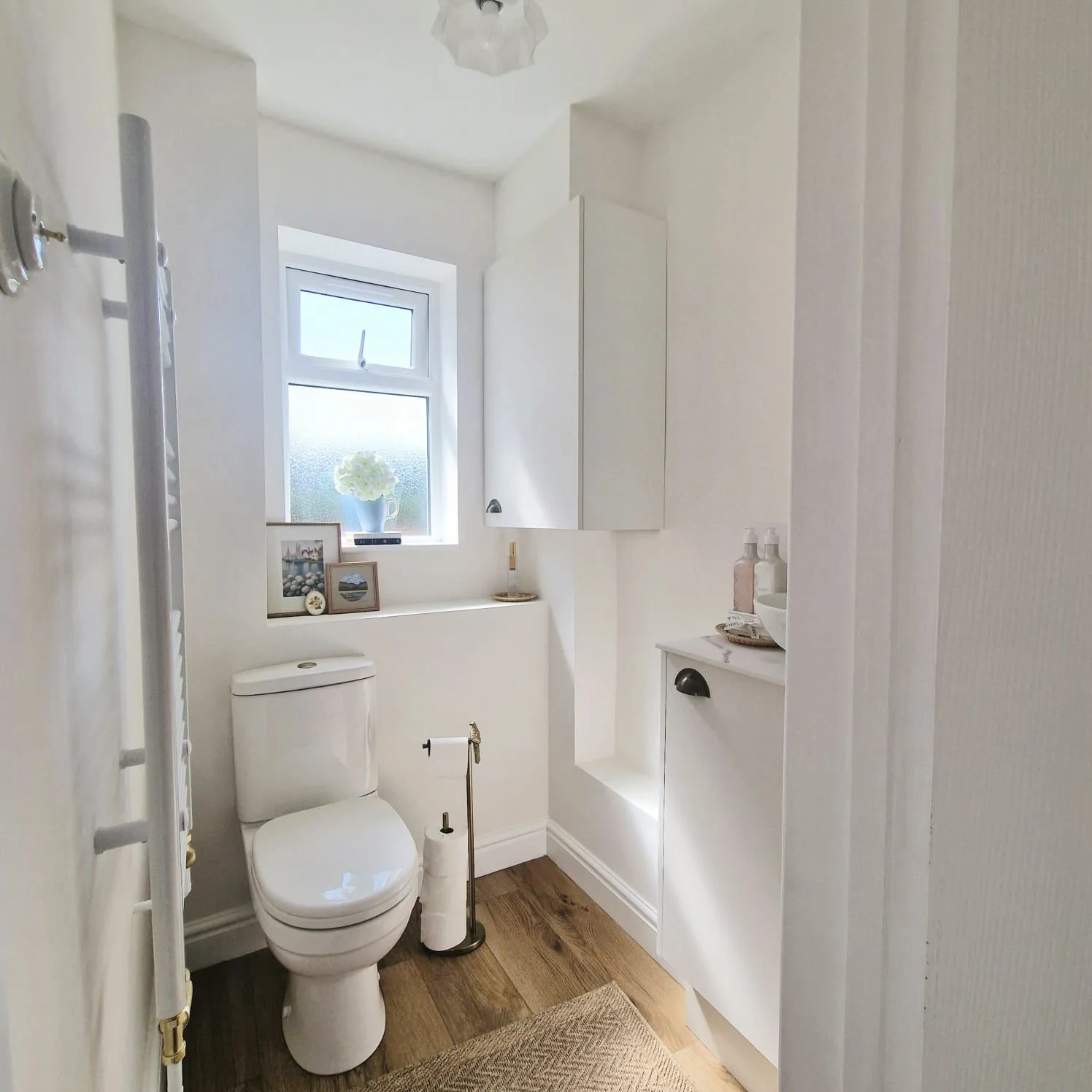 Completed downstairs cloakroom with fitted storage and a new window
