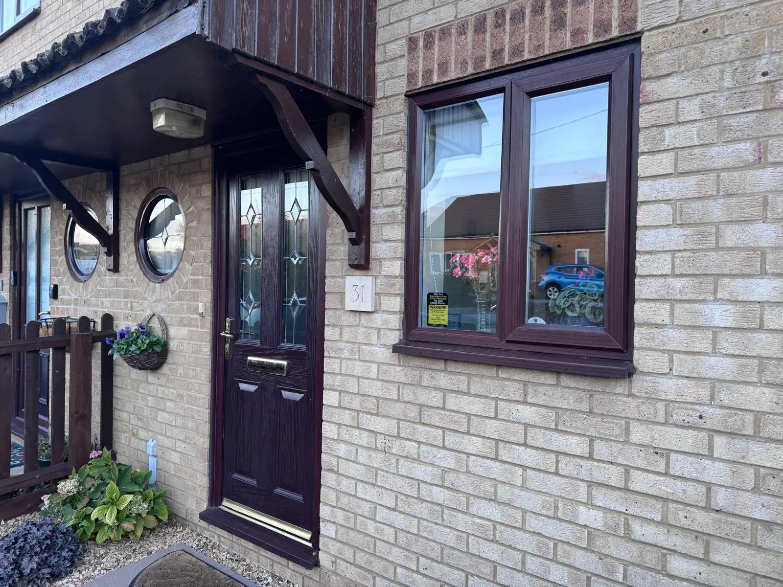 Brigstock home before the upgrade, with dark brown window frames