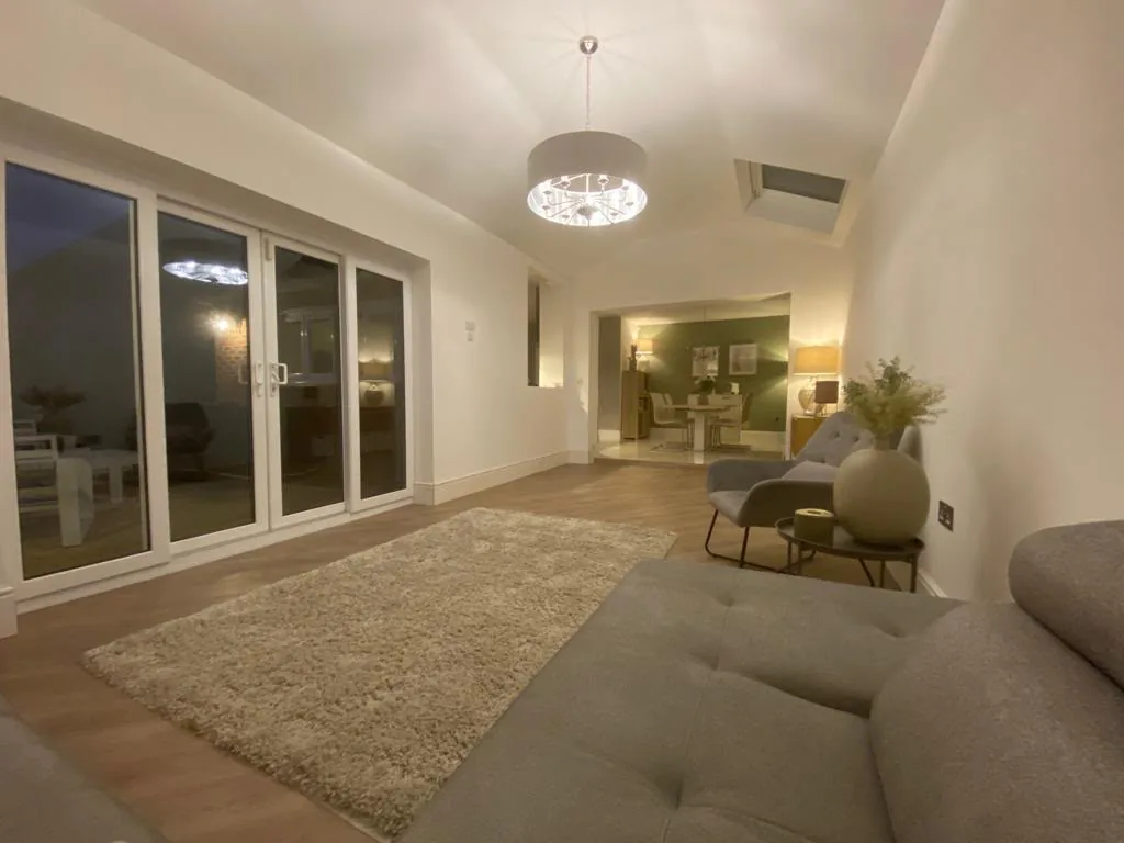 Completed extension interior opened into the existing living and dining rooms