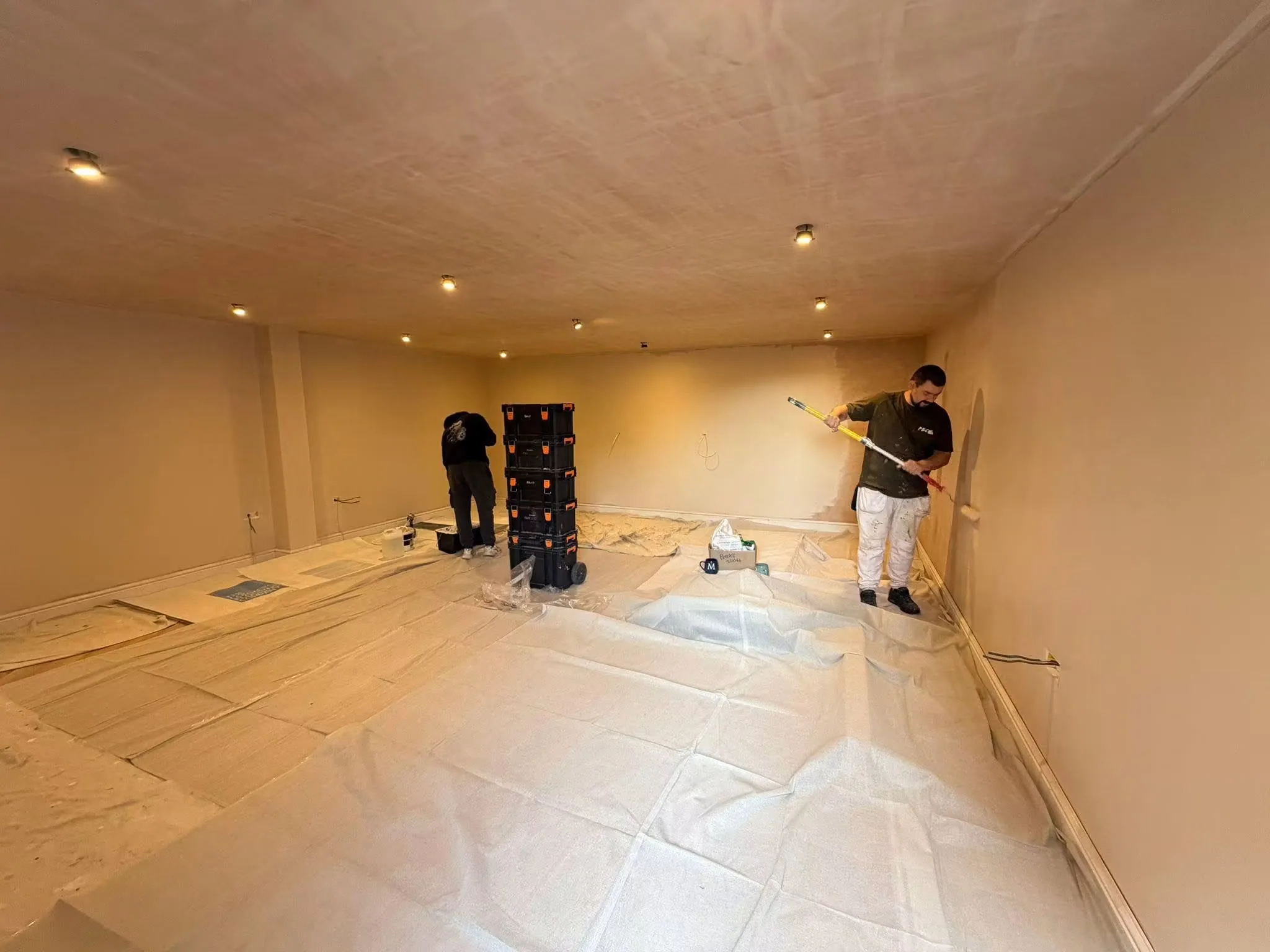 The garage conversion during plastering and decorating with new ceiling lighting installed