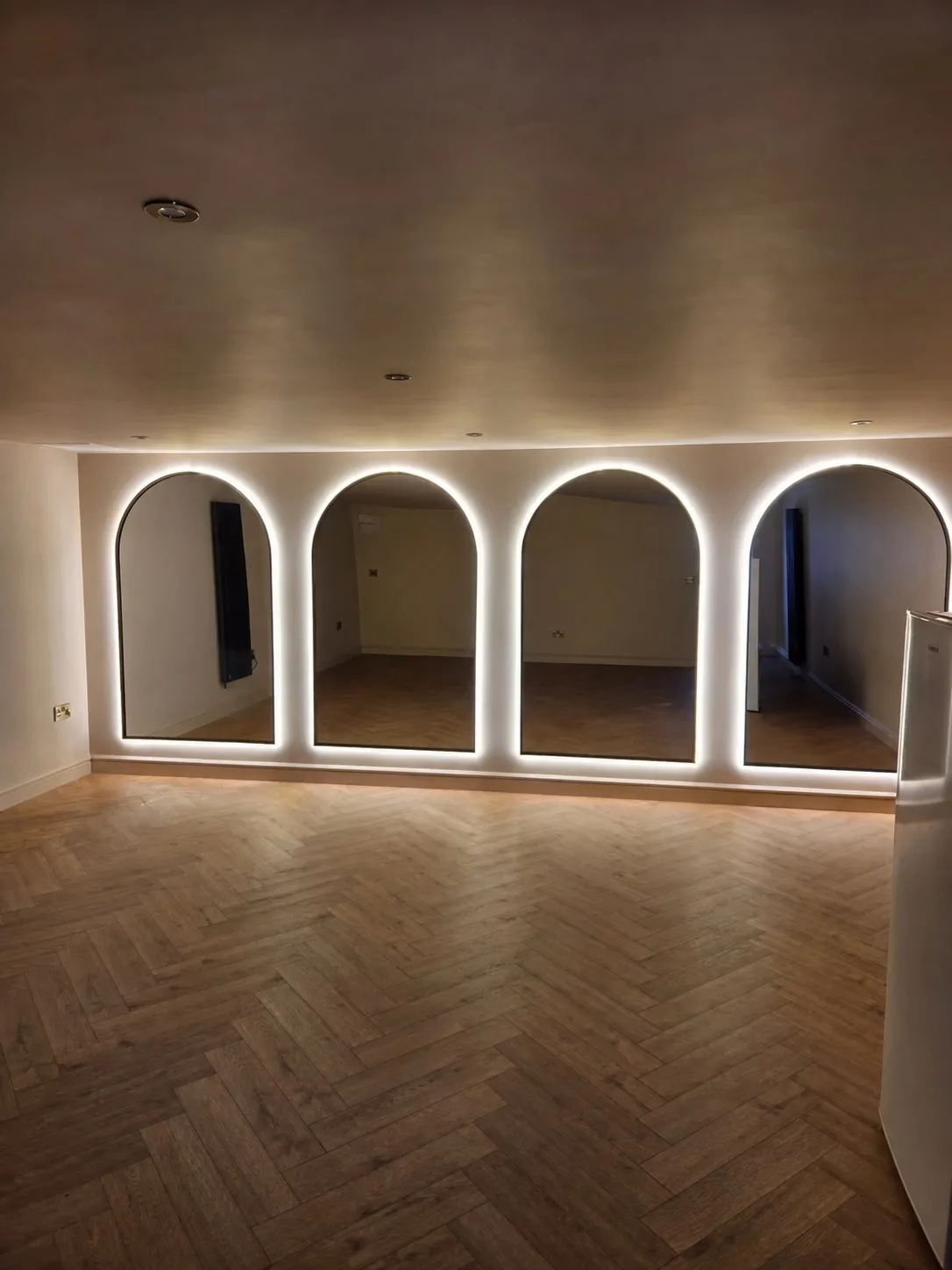 Completed interior of a double garage converted into a high-end family gym