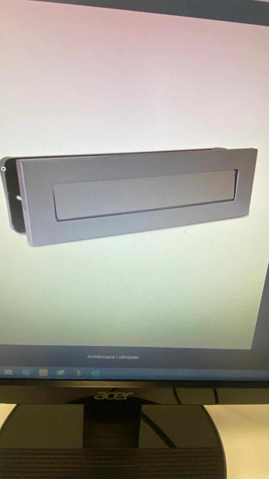 Contemporary rectangular letterplate option considered for the custom entrance door